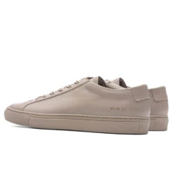Common Projects Original Achilles Low - Taupe 8 Common Projects Original Achilles Low - Taupe -Feature Clothing Common Projects Original Achilles Low Taupe 1528 0240 12 18 22 S NF Feature 10