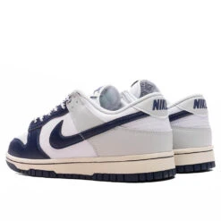 Nike Dunk Low Retro 'NY Yankees' - White/Midnight Navy/Photon Dust 8 Nike Dunk Low Retro 'NY Yankees' - White/Midnight Navy/Photon Dust -Feature Clothing Dunk Low Retro White Midnight Navy Photon Dust IM2222 101 08 20 25 Feature VR 4