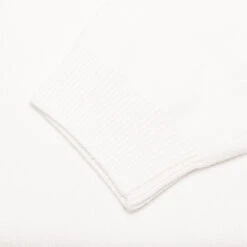 Essentials Knit Polo - Cloud Dancer 7 Essentials Knit Polo - Cloud Dancer -Feature Clothing Essentials Knit Polo Cloud Dancer 192BT232181F 10 19 23 Feature RV 13