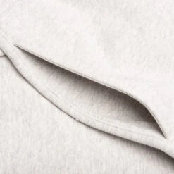 Fear Of God Essentials Sweatpant - Light Oatmeal 9 Fear Of God Essentials Sweatpant - Light Oatmeal -Feature Clothing Fear Of God Essentials Essentials Sweatpant Light Oatmeal 130SU224217F 01 26 23 Feature VR 5