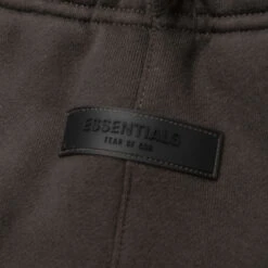 Kid's Essential Sweatpant - Off Black 9 Kid's Essential Sweatpant - Off Black -Feature Clothing Fear Of God Essentials Kid s Essential Sweatpant Off Black 785BT223000K 06 11 23 Feature KN 6