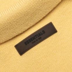 Kid's Knit Polo - Light Tuscan 9 Kid's Knit Polo - Light Tuscan -Feature Clothing Fear Of God Essentials Kid s Knit Polo Light Tuscan 785BT222332K 06 06 23 Feature VR 6