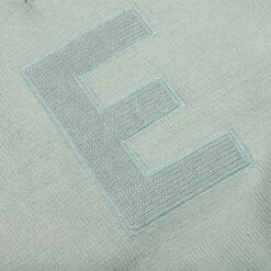 Kid's Knit Polo - Sycamore -Feature Clothing Fear Of God Essentials Kid s Knit Polo Sycamore 785BT222331K 06 07 23 Feature KN 7