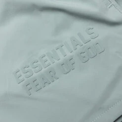 Kid's Running Short - Sycamore 9 Kid's Running Short - Sycamore -Feature Clothing Fear Of God Essentials Kid s Running Short Sycamore 785BT224121K 06 08 23 Feature MG 4