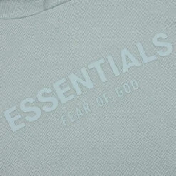 Waffle Raglan Hoodie - Sycamore 7 Waffle Raglan Hoodie - Sycamore -Feature Clothing Fear Of God Essentials Raglan Hoodie Sycamore 192BT224021F 06 11 23 Feature VR 4