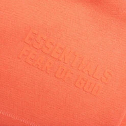 Essentials Sweatshort - Coral 11 Essentials Sweatshort - Coral -Feature Clothing Fear of God Essentials Essentials Short Coral 160SU222002F 01 10 23 Feature JP 12