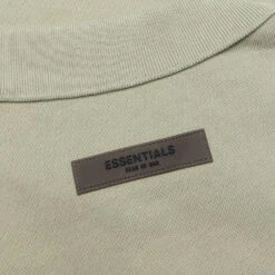 Essentials Kid's L/S Polo - Seafoam 11 Essentials Kid's L/S Polo - Seafoam -Feature Clothing Fear of God Essentials Kid s L S Polo Seafoam 785BT214191K 05 05 22 Feature 5