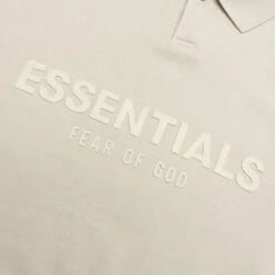 Essentials Kid's L/S Polo - Wheat 10 Essentials Kid's L/S Polo - Wheat -Feature Clothing Fear of God Essentials Kid s L S Polo Wheat 785BT214192K 05 05 22 Feature