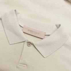 Essentials Kid's L/S Polo - Wheat 9 Essentials Kid's L/S Polo - Wheat -Feature Clothing Fear of God Essentials Kid s L S Polo Wheat 785BT214192K 05 05 22 Feature 8