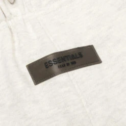 Essentials Kid's Shorts - Light Oatmeal 8 Essentials Kid's Shorts - Light Oatmeal -Feature Clothing Fear of God Essentials Kids Shorts Light Oatmeal 785BT214402K 11 23 22 Feature NF 45