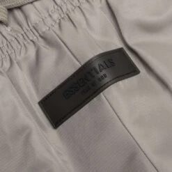 Essentials Kid's Track Pant - Desert Taupe 8 Essentials Kid's Track Pant - Desert Taupe -Feature Clothing Fear of God Essentials Kids Track Pant Desert Taupe 785BT214645K 11 22 22 Feature NF 49