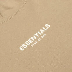 Essentials Relaxed Mockneck - Oak 7 Essentials Relaxed Mockneck - Oak -Feature Clothing Fear of God Essentials Relaxed Mockneck Oak 192BT212084F 11 02 22 Feature NF 2