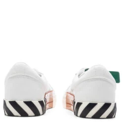 Low Vulcanized Canvas - White/Navy Blue 9 Low Vulcanized Canvas - White/Navy Blue -Feature Clothing Off White c o Virgil Abloh Low Vulcanized Canvas White Navy Blue OMIA085C99FAB0010146 04 11 23 Feature VR 10