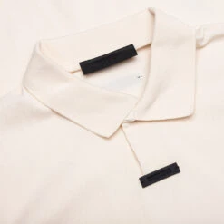 Pique Polo - Shell 8 Pique Polo - Shell -Feature Clothing Pique Polo Shell 125BT244332F 12 04 24 Feature KN 5