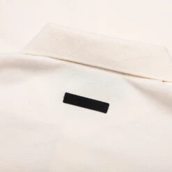 Pique Polo - Shell 9 Pique Polo - Shell -Feature Clothing Pique Polo Shell 125BT244332F 12 04 24 Feature KN 6