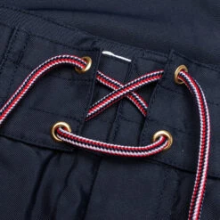 4-Bar Board Short - Navy -Feature Clothing Thom Browne Board Short with Drawstring Waist and 4Bar in Swim Tech Navy MTT029A 07538 415 06 14 22 Feature JP 6