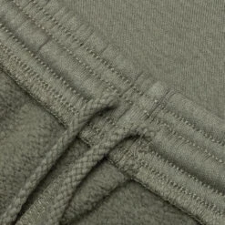 Wordmark Sweatshorts - Olive 11 Wordmark Sweatshorts - Olive -Feature Clothing Wordmark Sweatshorts Olive MOPQ SS25 23 OLI 03 08 25 Feature KN 8